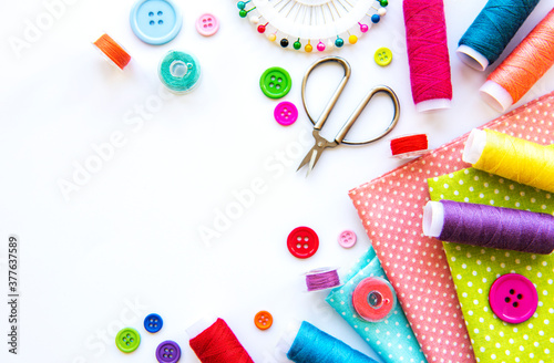 Sewing accessories on a white background © Olena Rudo