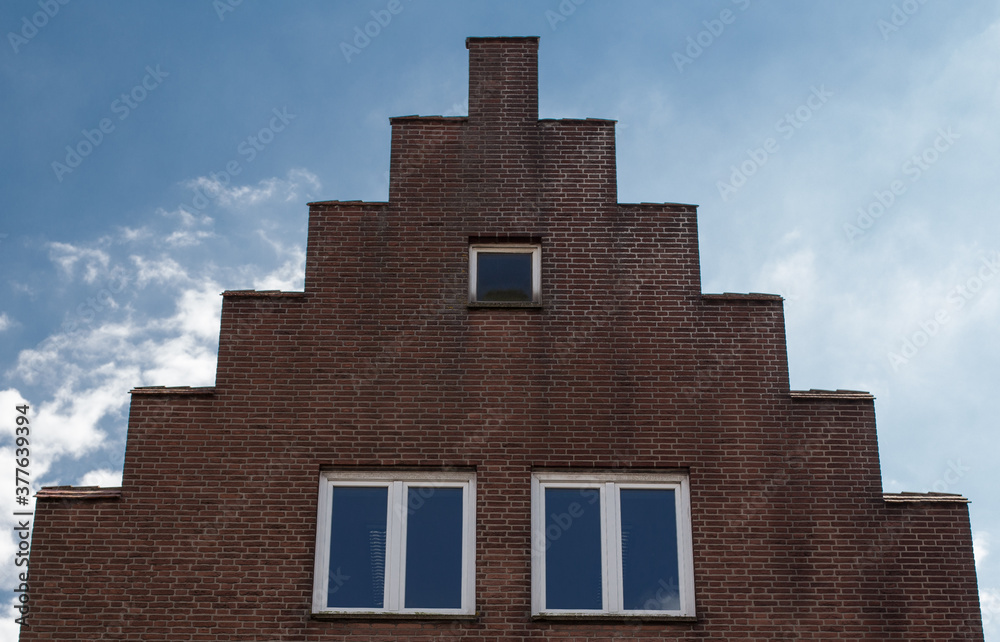 brick house in germany with a stepped roof