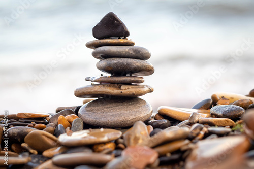 Sea stones at sunset on the shore