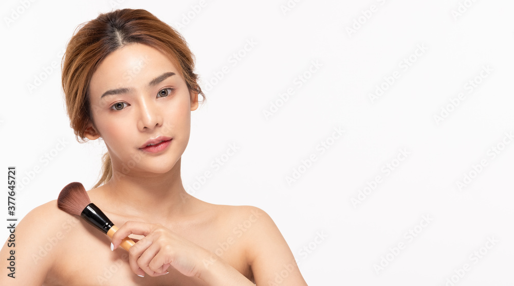 Beauty asian woman hold make up brush and cheerful with make up brush Beauty asian woman hold make up brush and cheerful with make up brush