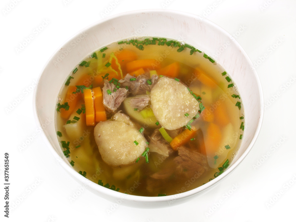 Beef Bone Marrow Soup with Vegetables and Spice isolated on white Background Beef Bone Marrow Soup with Vegetables and Spice isolated on white Background