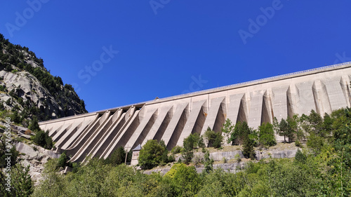 Wallpaper Mural Water dam seen from below, surrounded by trees on the mountain Torontodigital.ca