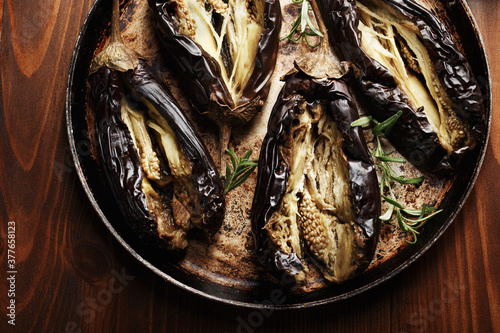 Aubergine - oven baked eggplant on pan