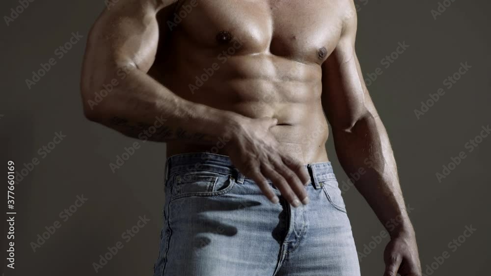 Muscular sexy man with naked torso. Hunk with athletic body. Muscular sexy man with naked torso. Hunk with athletic body.