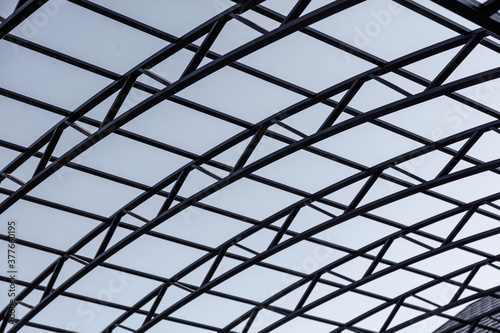 Frame of a metal canopy as a background.
