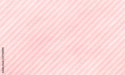 striped pink grunge background, with stripes of pink in different shades and grungy grainy texture. Diagonal stripes.