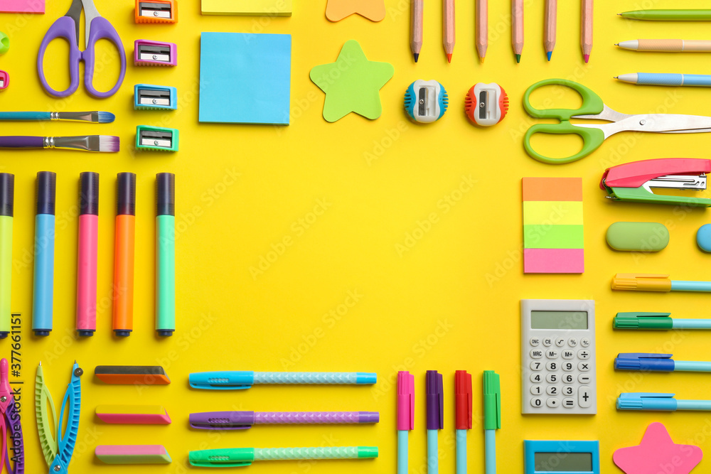 Frame of school stationery on yellow background, flat lay with space for text. Back to school Frame of school stationery on yellow background, flat lay with space for text. Back to school