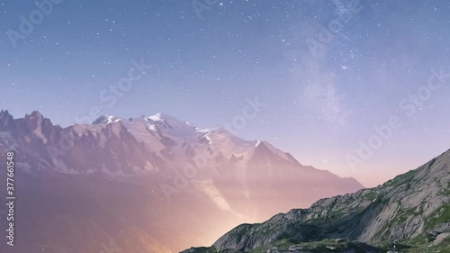 Night timelapse  from lake des Cheserys, Chamonix. Mont blanc and milky way as background elements. Camping tent as main subject in the foreground. Moon rising during the night.