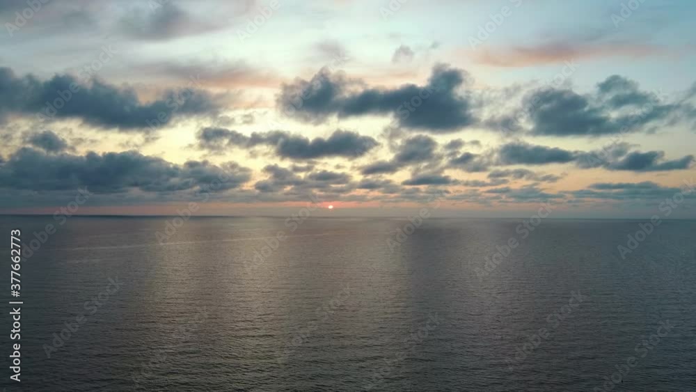 Dron Flying Over Sea in a Beautiful Sunset.  Sunrise Over the Sea. Colorful Sunset on the Baltic Sea, Latvia, Saulkrasti.