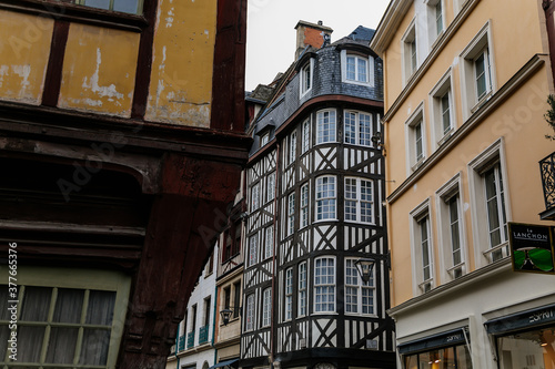 Fototapeta Naklejka Na Ścianę i Meble -  On the streets of the old town of Rouen with traditional half-timbered heritage houses. Rouen, Normandy, France