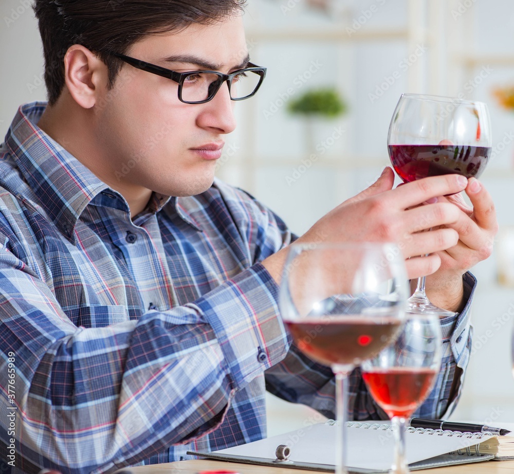 The professional sommelier tasting red wine The professional sommelier tasting red wine