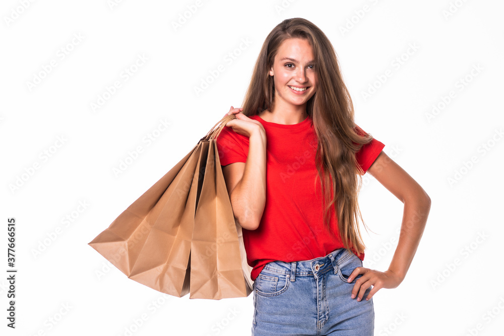 Happy woman with shopping bags on white background