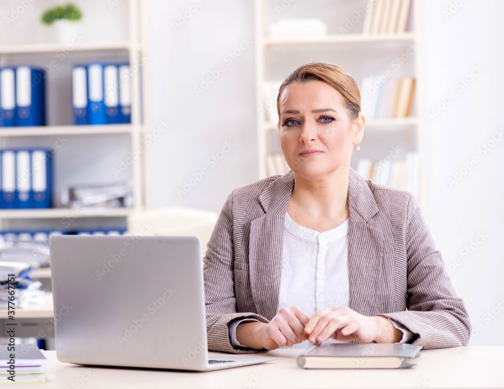 Businesswoman employee working in the office