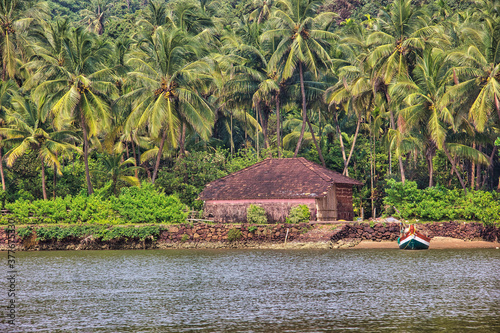 Malvan sea beach with boat, Maharashtra, India photo