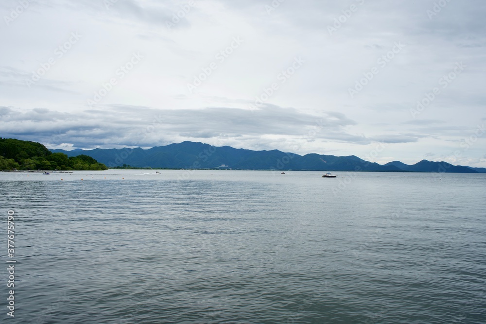 The Inawashiro lake view with boat.