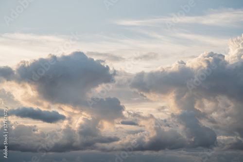 Evening sky with clouds and warm sun light