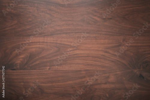Texture of toned black walnut wood with oil finish