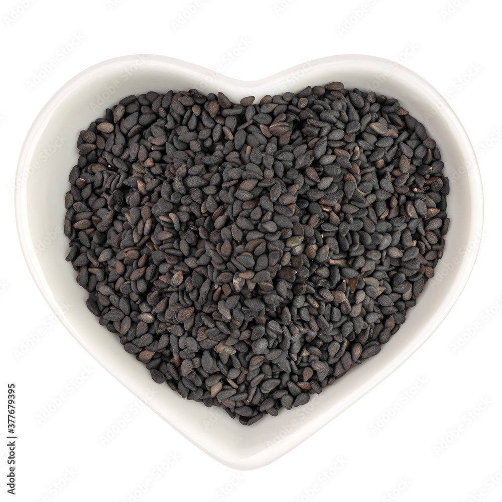 black sesame in heart shaped plate black sesame in heart shaped plate