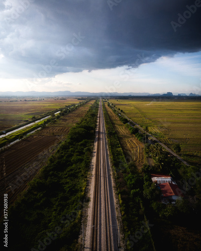 Railway track heading into the horizon in Kodiang  Malaysia