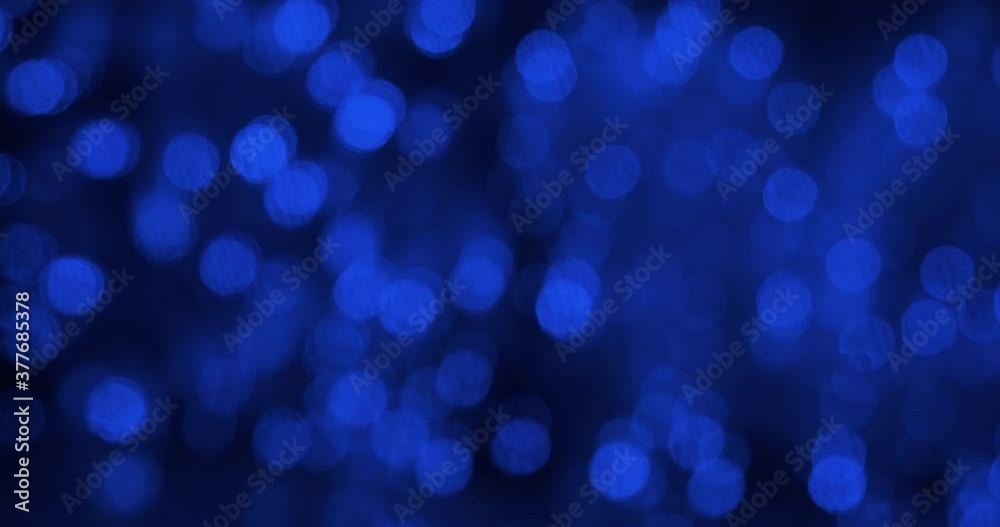 Abstract blur bokeh. Approximation bright blue lights. Abstract background defocused lights. Defocused bokeh lights and lens flare. Abstract blur bokeh. Approximation bright blue lights. Abstract background defocused lights. Defocused bokeh lights and lens flare.