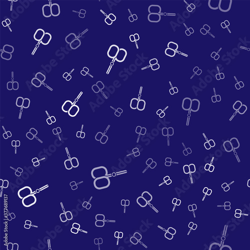White Nail scissors cuticle cut beauty salon icon isolated seamless pattern on blue background. Cosmetic scissors for manicure. Vector.