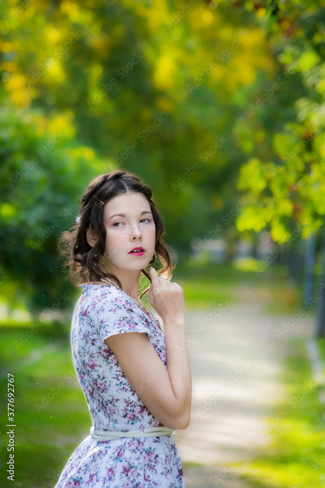 Young sad women in a park on a warm autumn day. Young sad women in a park on a warm autumn day.