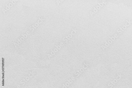 White paper texture as background. Copy space for text