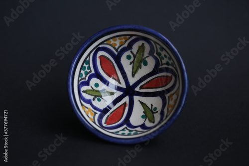 andalusian ceramic bowl on dark background. High quality photo