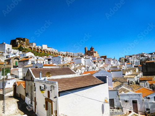 Pisticci and its white buildings from Rione Dirupo, Matera, Basilicata, Italy, Europe. photo