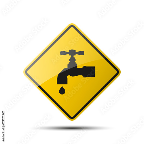yellow diamond road sign with a black border and an image faucet on white background. Illustration