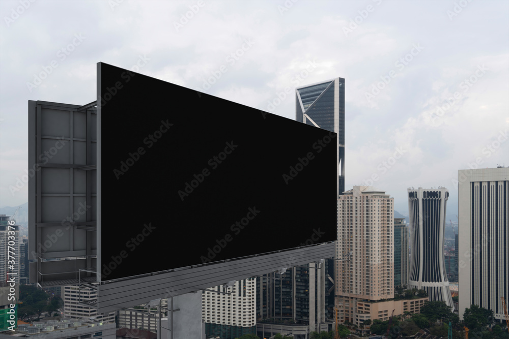 Blank black road billboard with Kuala Lumpur cityscape background at day time. Street advertising poster, mock up, 3D rendering. Side view. The concept of marketing communication. Blank black road billboard with Kuala Lumpur cityscape background at day time. Street advertising poster, mock up, 3D rendering. Side view. The concept of marketing communication.