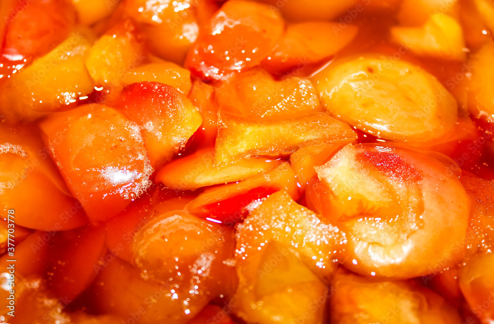Cooked Apple jam with Apple slices close-up. Cooked Apple jam with Apple slices close-up.