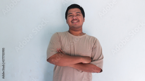 asian fat man smilling pose
