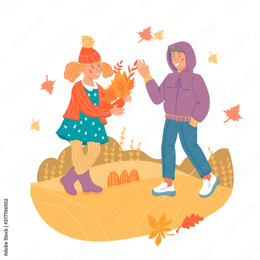 Fototapeta premium Children boy and girl in autumn clothes with yellow leaves at walk, flat vector illustration isolated on white background. Autumn or fall season kids characters.