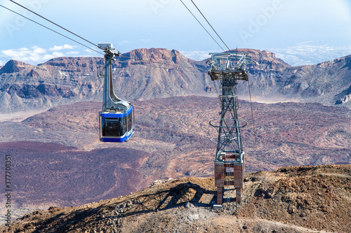 The Teide Volcano cable car with the characteristic valley of stone in the background.