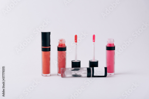 Lipstick in different colors on a light background © ShevarevAlex