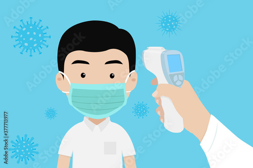 Teacher holding infrared thermometer to measure body temperature  at school. Child wearing a surgical mask protection of virus. Concept of protection corona virus or covid-19