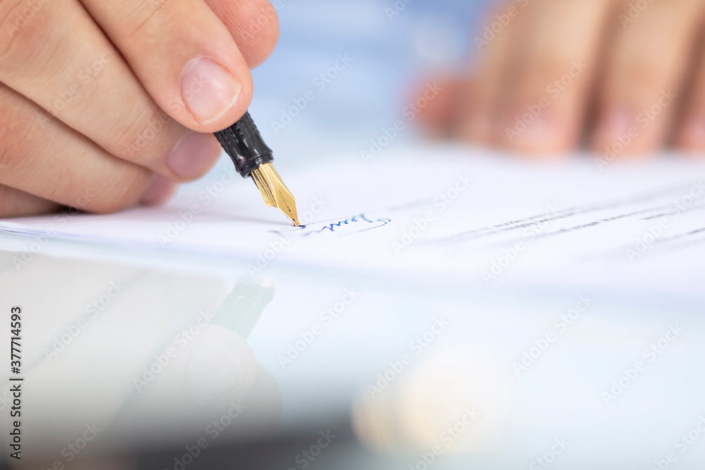 Businessman signs a contract, business contract details Businessman signs a contract, business contract details