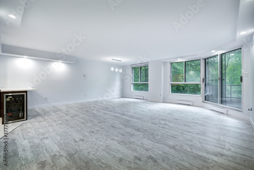 Real estate photography - Beautiful empty renovated apartment in an apartment building with bathroom  new kitchen  new floors  all white painted