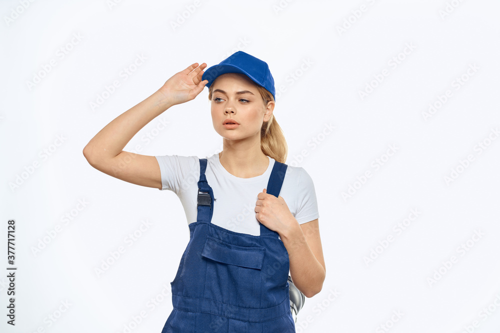 Woman in working uniform blue cap delivery courier delivery service