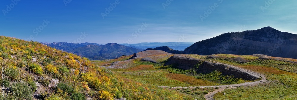 Timpanogos hiking trail landscape views in Uinta Wasatch Cache National Forest, around Utah Lake, in the Rocky Mountains in fall. Views of Midway, Heber, Provo city, Salt Lake and Utah County. USA. Timpanogos hiking trail landscape views in Uinta Wasatch Cache National Forest, around Utah Lake, in the Rocky Mountains in fall. Views of Midway, Heber, Provo city, Salt Lake and Utah County. USA.