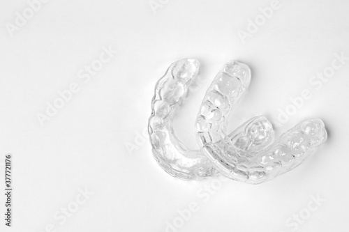 Konstfotografi Invisible orthodontic removable braces on a white background with copy space