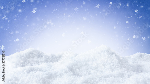 Winter snow background with snowflakes  over blue. © Inna Dodor