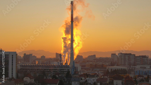 AERIAL: Power plant near residential neighborhood in Ljubljana pollutes the air.