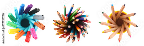 Set of bright pencils and felt tip pens on white background, top view. School stationery, banner design photo