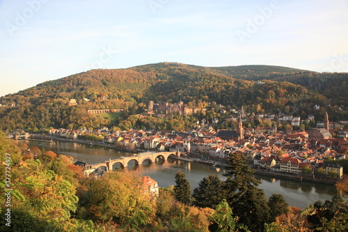 Aerial view of Heidelberg old town and Castle with Old Bridge over the river Neckar during sunset in autumn in Heidelberg, Germany