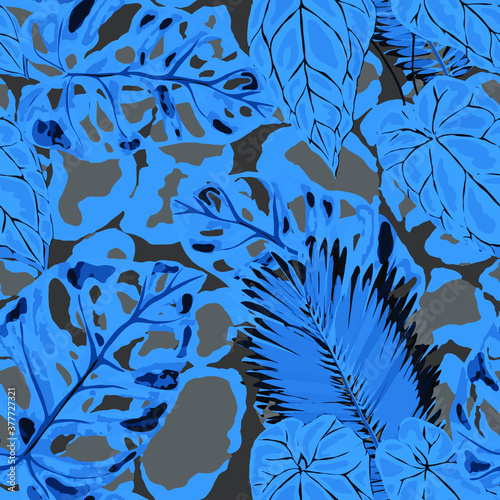 Tropical seamless pattern on animalistic texture. Jungle exotic summer print. Summer tropical leaf. Tropical flower fashion pattern. Floral tropic illustration. Vector seamless pattern.