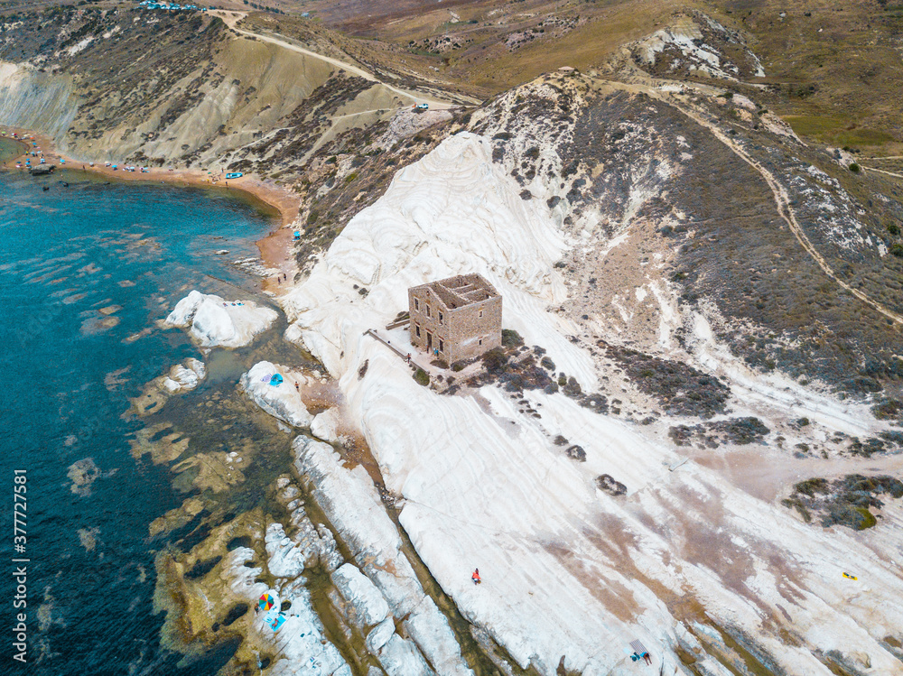 Punta Bianca, Agrigento in Sicily Italy - White beach with old ruins of abandoned stone house on white cliffs