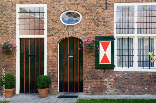 Turnhout beguinage, Windows with red and white shutter, Belgium, Unesco World Heritage Site.