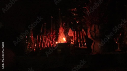 Candles and glowing incense at an altar during a prayer ceremony for Pchum Ben (Ancestor's Day), a 15-day Cambodian religious festival  the end of the Buddhist lent, Vassa photo
